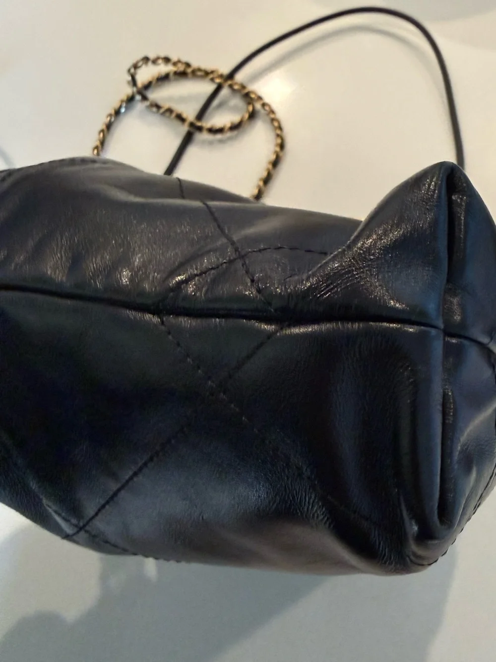 CHANEL 22 Black Quilted Leather Crossbody with Pearl-Trim Chain